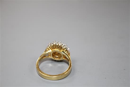 A modern 18ct gold and diamond cluster dress ring,